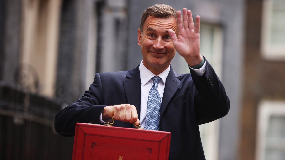 UK-Chancellor-Jeremy-Hunt-leaves-Downing-Street-with-the-despatch-box-to-present-his-spring-budget-to-parliament-on-March-15-2023-in-London-England.jpg