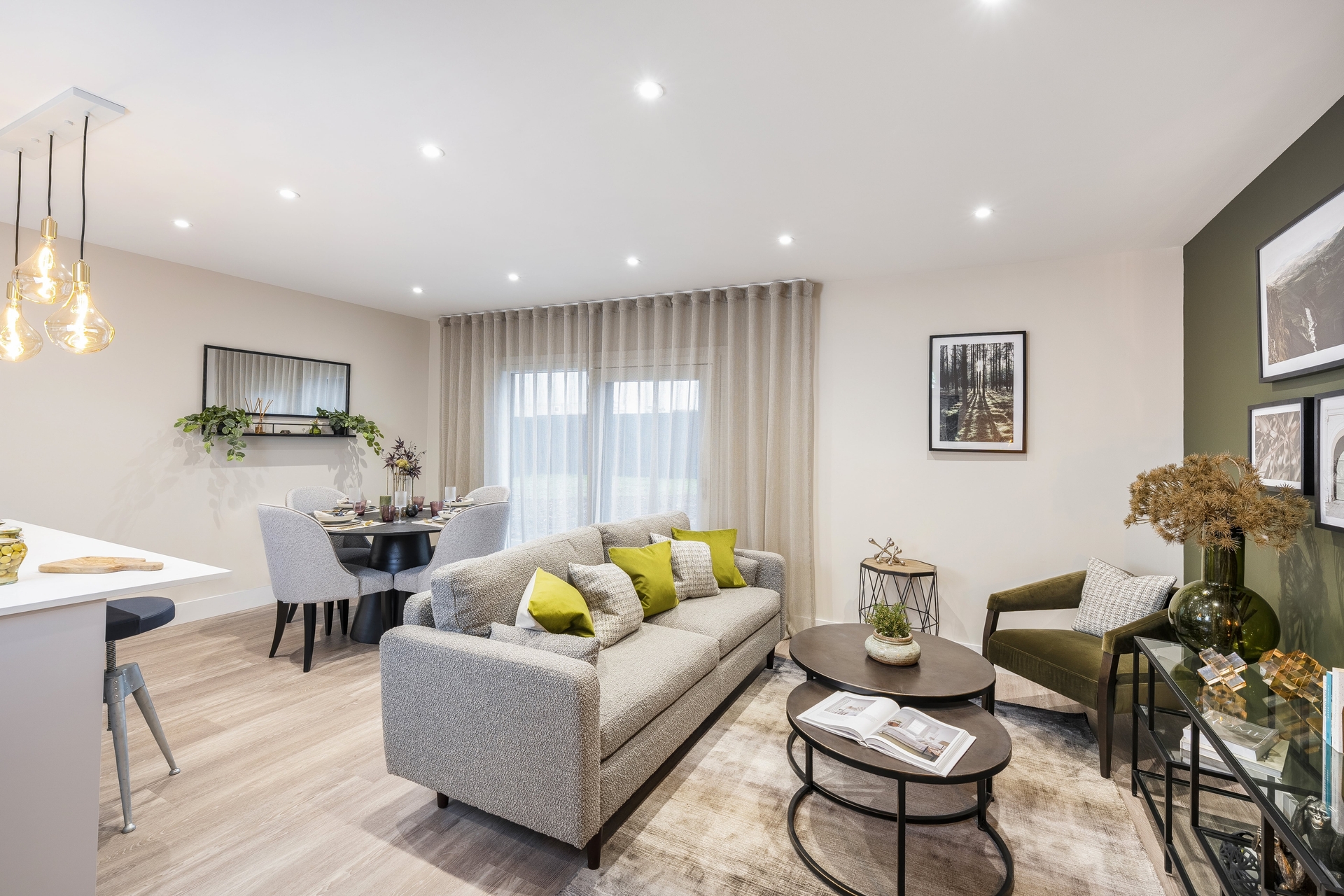 Living Room - Green, White Grey sofa. Contemporary Show Apartment now open at St. Leonards Quarter, Exeter