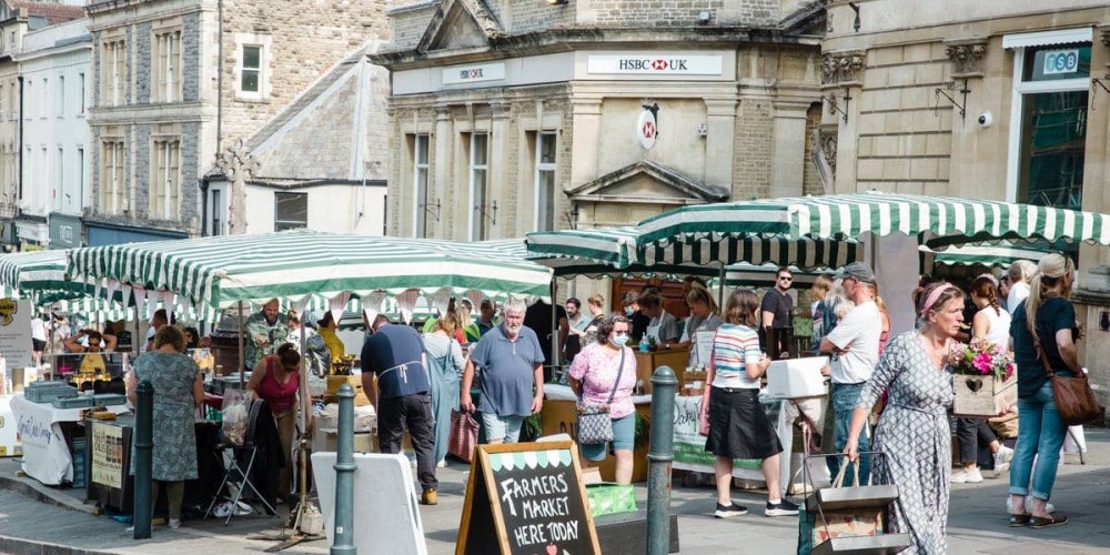 Farmers Market on a sunny day in Frome, Somerset, Acorn Property Invest