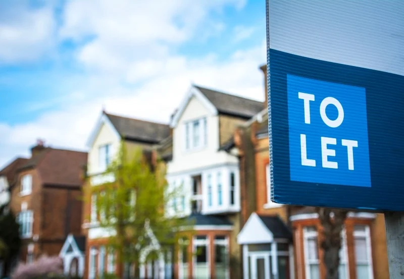 A "to let" sign outside a Victorian home in London.